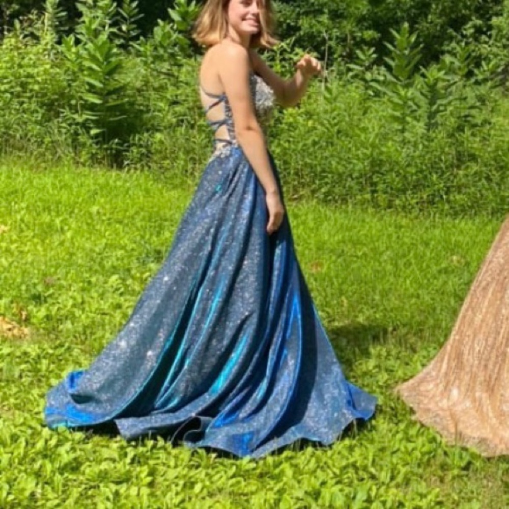 Size 4, used once for pictures, was supposed to be prom dress but COVID happened